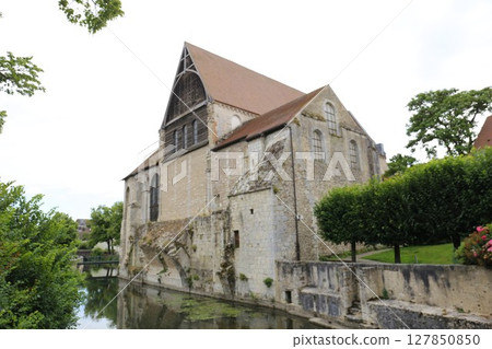 The Saint-André Church, which dates back to the 12th century, is located on the River Eure in Chartres, a city in the Loire region that still retains its medieval streetscape. 127850850