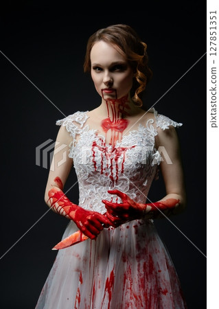Bridal beauty with a katana and a chilling touch of murder 127851351