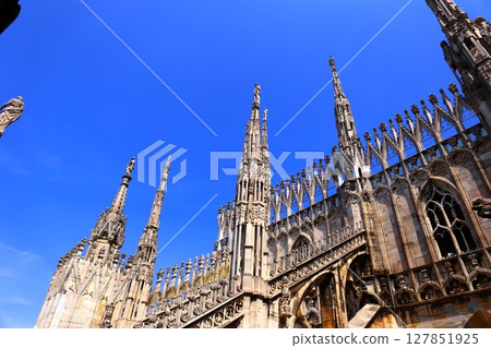 Milan Duomo spire Milan Duomo spire 127851925