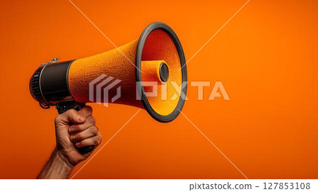 hand with megaphone on yellow background hand with megaphone on yellow background 127853108