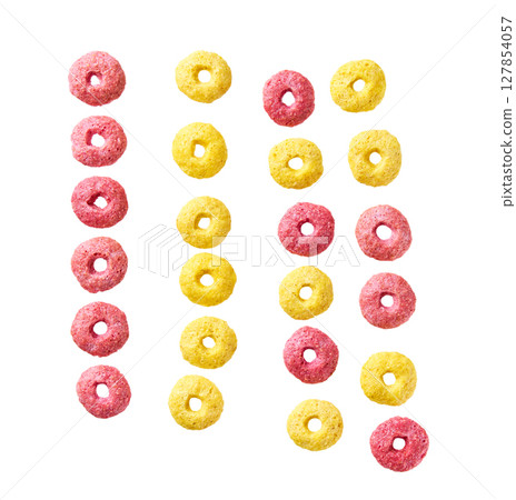 corn rings and strawberry rings rings isolated on white background top view. colorful corn rings . 127854057