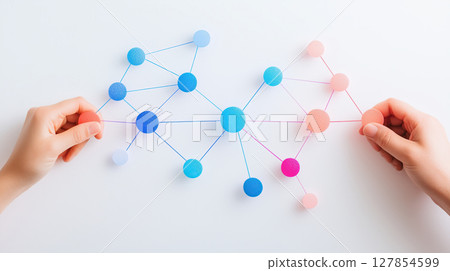 Colorful network of interconnected circles held by hands, symbolizing connection and collaboration 127854599