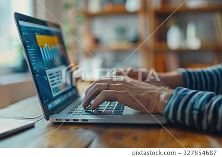 Business, finance and investment concept. Marketing woman using laptop 127854687