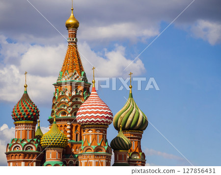 Detail of the colorful onion shaped domes of Saint Basil's Cathedral, Red Square, Moscow, Russia 127856431
