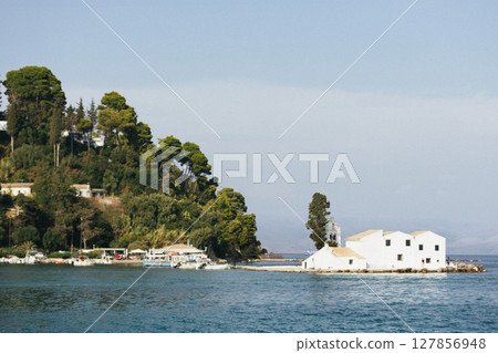view of Vlacherna monastery island at sunrise, Kanoni, Corfu island Greece view of Vlacherna monastery island at sunrise, Kanoni, Corfu island Greece 127856948