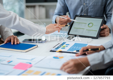 Asian business people working as a good team in the office. Successful teamwork in a meeting, workplace concept. 127857793