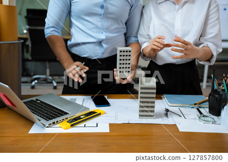 architect or engineer team working on table use drawing tool on the paper plan for business architectural project. 127857800