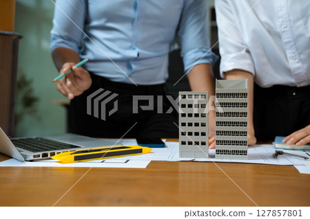 architect or engineer team working on table use drawing tool on the paper plan for business architectural project. 127857801