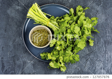 Organic fresh cilantro leaves. Organic fresh cilantro leaves. 127857876