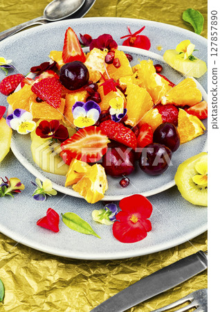 Appetizing summer fruit salad. 127857890