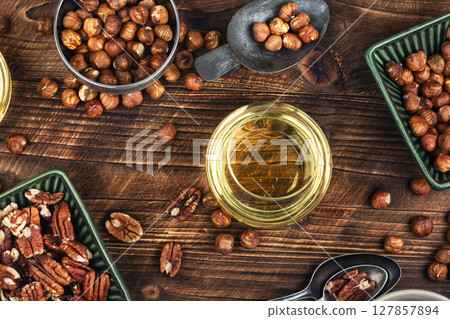 Healthy vegetable nuts oil bottle. Healthy vegetable nuts oil bottle. 127857894