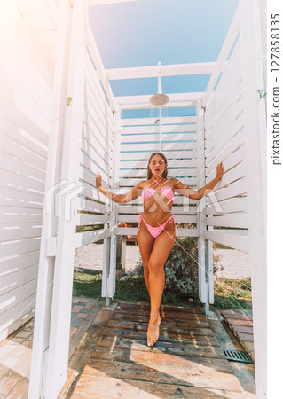 Beach Shower Woman Pink Bikini: Summer Beach Hygiene Outdoor Shower Photo Beach Shower Woman Pink Bikini: Summer Beach Hygiene Outdoor Shower Photo 127858135