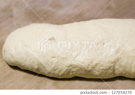 High-hydration bread dough after the second rise that has risen considerably 127858270