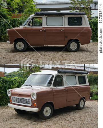 Vintage brown and white van parked on gravel Vintage brown and white van parked on gravel 127858444