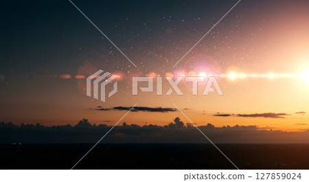 Stunning sunset sky with lens flare and dramatic clouds for atmospheric design 127859024