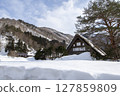 Old houses in Shirakawa-go, Gifu Prefecture in early spring 127859809