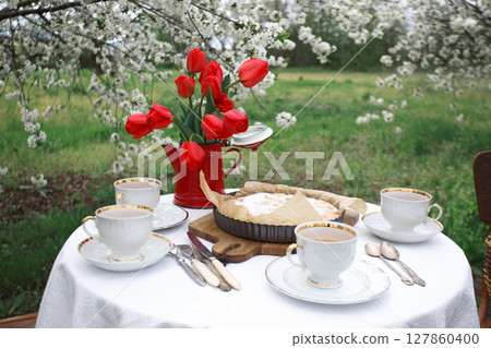 breakfast in the spring garden breakfast in the spring garden 127860400