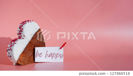 Valentine's Birthday Mother's Women's day BE HAPPY wishes saying caption on greeting card Delightful heartshaped pastry croissant treat, beautifully topped with colorful frosting galore. Copy space 127860518