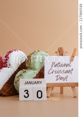 International croissant day saying caption on greeting card Delightful heartshaped pastry croissant treat, beautifully topped with colorful frosting galore. Copy space. Food experimentation viral International croissant day saying caption on greeting card Delightful heartshaped pastry croissant treat, beautifully topped with colorful frosting galore. Copy space. Food experimentation viral 127860589