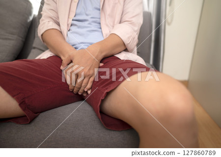 Man having urinary tract infection or bladder infection, premature ejaculation, fertility issues, and prostate cancer disease. Healthcare concept 127860789