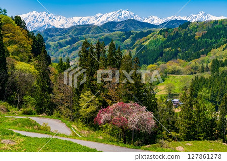 Snow-capped mountains in the distance Snow-capped mountains in the distance 127861278