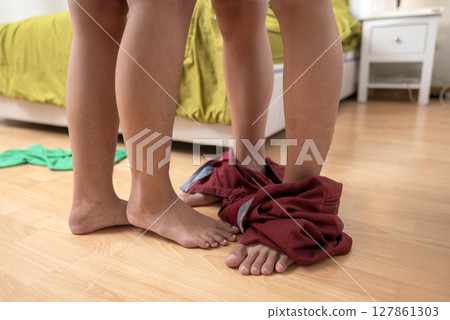 Couple feeling intense sexual pleasure. Naked lovers have passionate sex. A passionate couple has sex and makes love in the bedroom 127861303