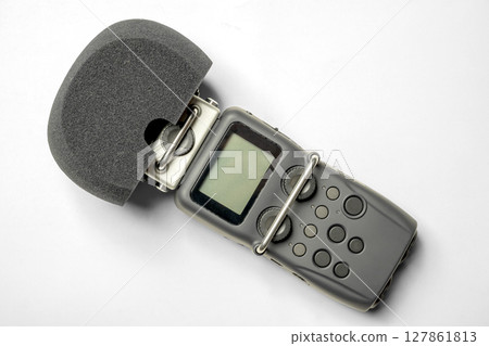 Handy recorder device on a white background. Top view 127861813