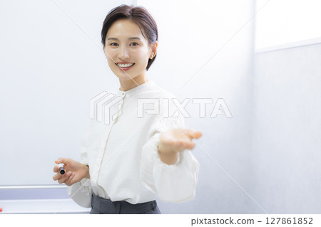 Young lady, business woman, office casual Young lady, business woman, office casual 127861852