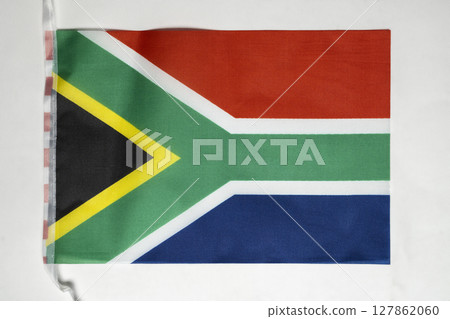 Closeup view of the South Africa national flag isolated over a white background. Concept of government and nationality 127862060