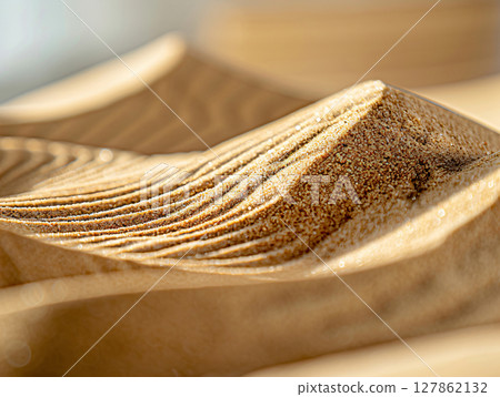 Summer background of beach sand in the foreground and sea in the background, close up sand. AI Generated. 127862132