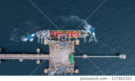 Aerial view LPG gas tanker ship on deep blue sea, Global business freight shipping import export logistic transportation oil and gas product tanker ship, Liquefied Petroleum Gas LPG tanker ship in sea Aerial view LPG gas tanker ship on deep blue sea, Global business freight shipping import export logistic transportation oil and gas product tanker ship, Liquefied Petroleum Gas LPG tanker ship in sea 127862161