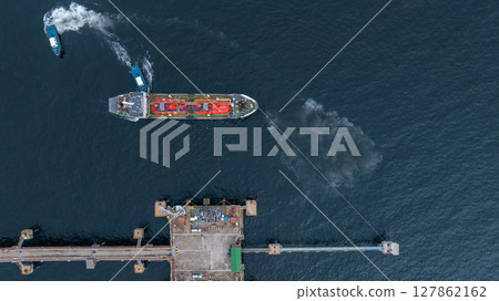 Aerial view LPG gas tanker ship on deep blue sea, Global business freight shipping import export logistic transportation oil and gas product tanker ship, Liquefied Petroleum Gas LPG tanker ship in sea Aerial view LPG gas tanker ship on deep blue sea, Global business freight shipping import export logistic transportation oil and gas product tanker ship, Liquefied Petroleum Gas LPG tanker ship in sea 127862162