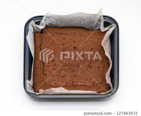 Baked brownie in metal pot Baked brownie in metal pot 127863672