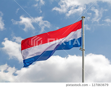 Netherlands flag on sky Netherlands flag on sky 127863679