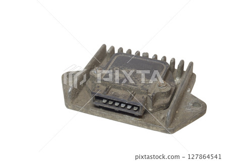 electronic ignition control module with pin blade terminal, dusty, isolated on white background 127864541