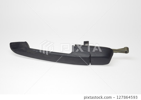 black outside car rear door handle. Automotive spare part. on white background, with clipping path black outside car rear door handle. Automotive spare part. on white background, with clipping path 127864593