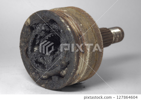 constant velocity joint of front wheel drive car, dismantlet for replacing, dirty, worn, with clipping path 127864604
