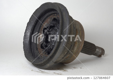 constant velocity joint, lube inside, metal bearing balls in race and metal cage, remains of torn protective rubber cover 127864607