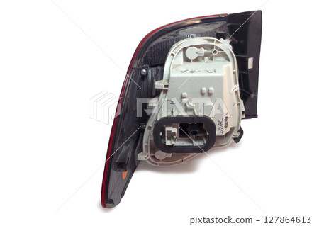 taillight of sedan. rear side, on white background, with clipping path 127864613