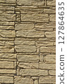 Stacked stone wall background 127864635
