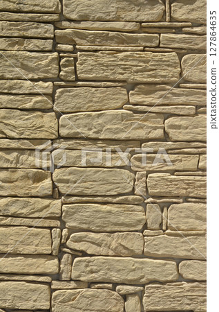 Stacked stone wall background Stacked stone wall background 127864635