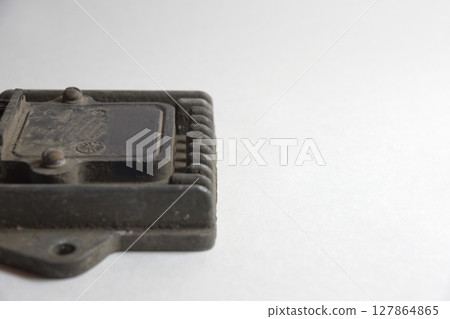 electronic ignition control module on aluminium mounting plate with profile. closeup electronic ignition control module on aluminium mounting plate with profile. closeup 127864865