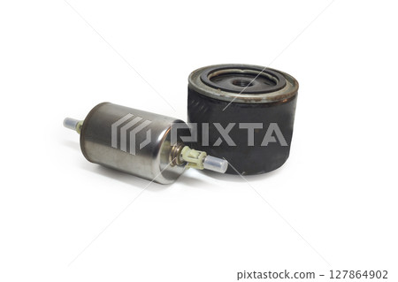 fuel and oil filters in metal housings. clips for fixing fuel lines, holes for filling filters. isolated on white background, with clipping path 127864902