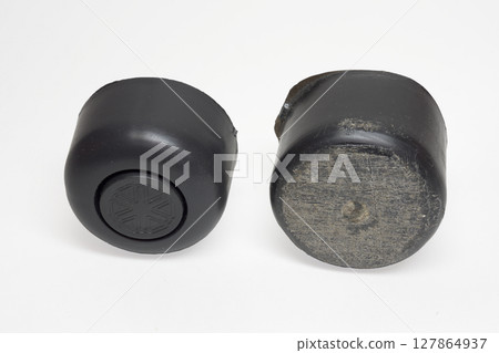 plastic sofa legs. adjustable leveling leg for replacement of old worn sofa leg. isolated on white background, with clipping path 127864937