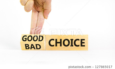Good or bad choice symbol. Concept words Good choice or Bad choice on beautiful wooden blocks. Beautiful white table white background. Businessman hand. Business good bad choice concept. Copy space. Good or bad choice symbol. Concept words Good choice or Bad choice on beautiful wooden blocks. Beautiful white table white background. Businessman hand. Business good bad choice concept. Copy space. 127865017