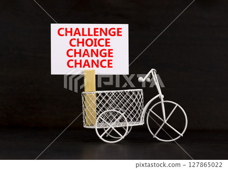 Challenge choice change chance symbol. Concept words Challenge choice change chance on beautiful white paper. Beautiful black background. Business Challenge choice change chance concept. Copy space. Challenge choice change chance symbol. Concept words Challenge choice change chance on beautiful white paper. Beautiful black background. Business Challenge choice change chance concept. Copy space. 127865022