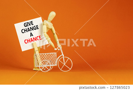 Give change a chance symbol. Concept words phrase Give change a chance on beautiful white paper on clothespin. Beautiful orange paper background. Business Give change a chance concept. Copy space. Give change a chance symbol. Concept words phrase Give change a chance on beautiful white paper on clothespin. Beautiful orange paper background. Business Give change a chance concept. Copy space. 127865023
