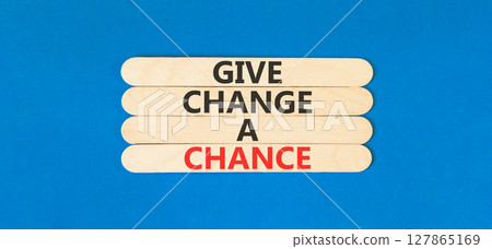 Give change a chance symbol. Concept words phrase Give change a chance on beautiful wooden stick. Beautiful blue paper background. Business Give change a chance concept. Copy space. Give change a chance symbol. Concept words phrase Give change a chance on beautiful wooden stick. Beautiful blue paper background. Business Give change a chance concept. Copy space. 127865169