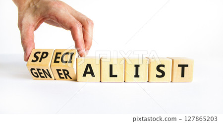 Specialist or globalist symbol. Concept words Specialist Globalist on beautiful wooden blocks. Beautiful white background. Doctor hand. Business specialist or globalist concept. Copy space 127865203