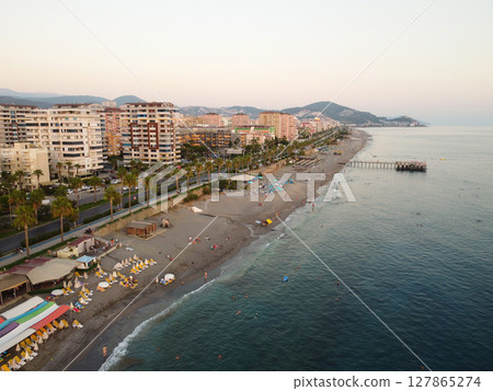 Aerial view of beachfront cityscape at sunset 127865274